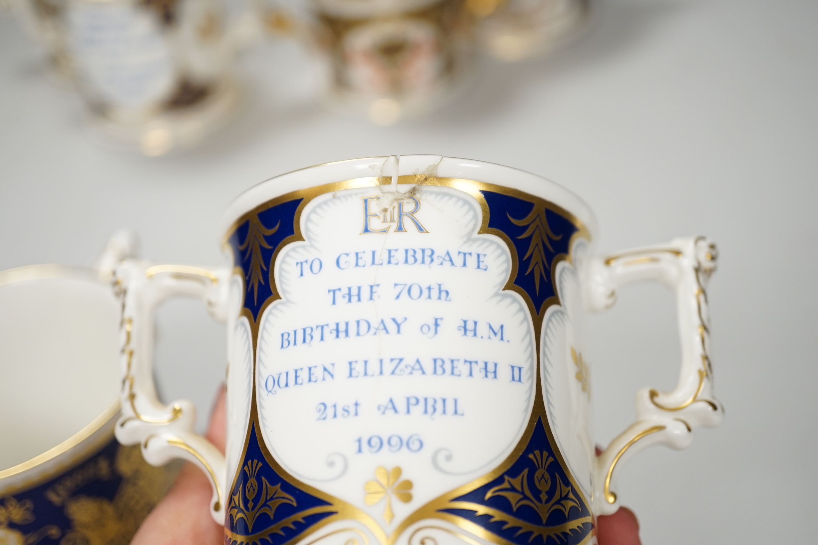 Six Royal Crown Derby Royal commemorative two handled cups